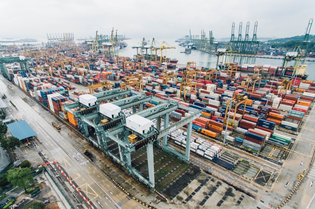 Aerial view of a container terminal with gantry cranes — Zeen Freight forwards cargo through major ports to more than 80 countries